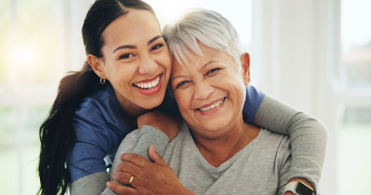 Caregiver supporting a senior at home